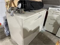 Global 2 door filing cabinet with old golf club