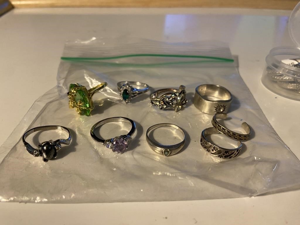 Large lot of silver and gold colored rings
