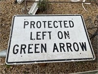 PROTECTED ON GREEN ARROW SIGN