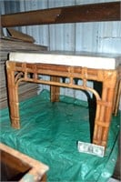 Wicker table with stone top