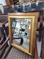 Brown snd gold framed mirror