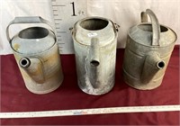 Three Vintage Galvanized Watering Cans