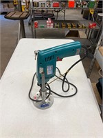 Portable drill press with Makita corded drill