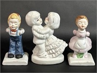 Porcelain Boy and Girl Figurines