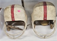 2 Football Helmets