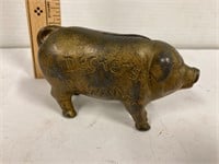 Cast iron pig. Piggy bank.