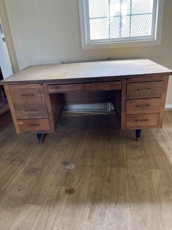 Large wooden desk with dove tail drawers. 2