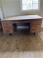 Large wooden desk with dove tail drawers. 2
