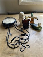 4 Avon bottles and a wall hanging clock