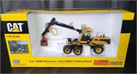 NIB Caterpillar CAT 580B Harvester w/HH65 Head