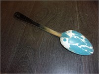 odd antique spoon large blue swirel