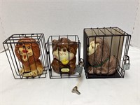 Three Animal Banks in Cages
