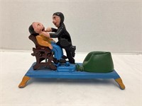 Cast Iron Dentist Pulling Tooth Coin Bank
