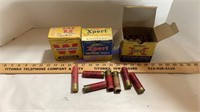 Old ammo boxes & 10 gauge shells, empty