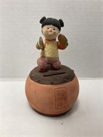 Asian Child Coin Bank