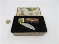 Couteau de poche de collection avec rhinocéros