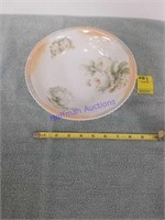 Peach and white rose pattern serving bowl.