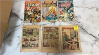 Three 25¢ comics (justice league, super boy, and