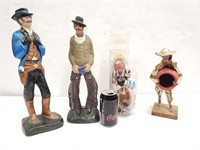 Four Cowboy Figurines