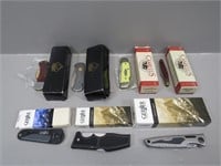 7 Puma, Camillus, and Gerber folding knives with