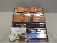 8 Beretta folding knives and display case – two