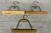 (3) 1903 Fred M Nye Co Wooden Hangers