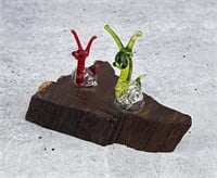 Blown Glass Miniature Snails on Ironwood