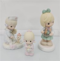 3 precious moments figurines