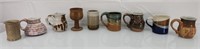 Large lot of pottery mugs