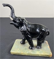 Metal Elephant on Marble