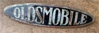 Vintage Metal Oldsmobile Badge