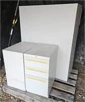 three file cabinets