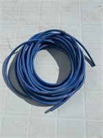 Blue automatic waterer tubing.
