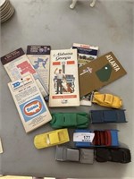 Vintage road maps and toy plastic cars