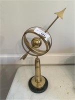 Brass sphere sculpture