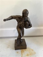Bronze finished football player statue