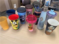 Lots of kid cups, and water bottles