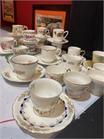 Lot of 16 mini tea cups and saucers plus 4 cups