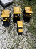 four metal Tonka trucks ready for the outdoors