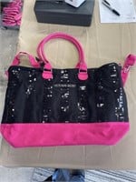 Victoria’s Secret pink and black bag