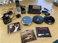 Older electronics and CDs answering machine, CD