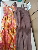 Both new. Dress is one size. Bibs are XL
