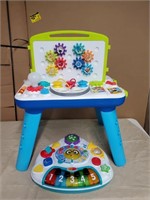 2 baby Einstein tables. 1 is missing legs. And 1