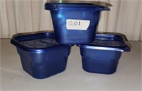 Threee small ziplock containers with lids