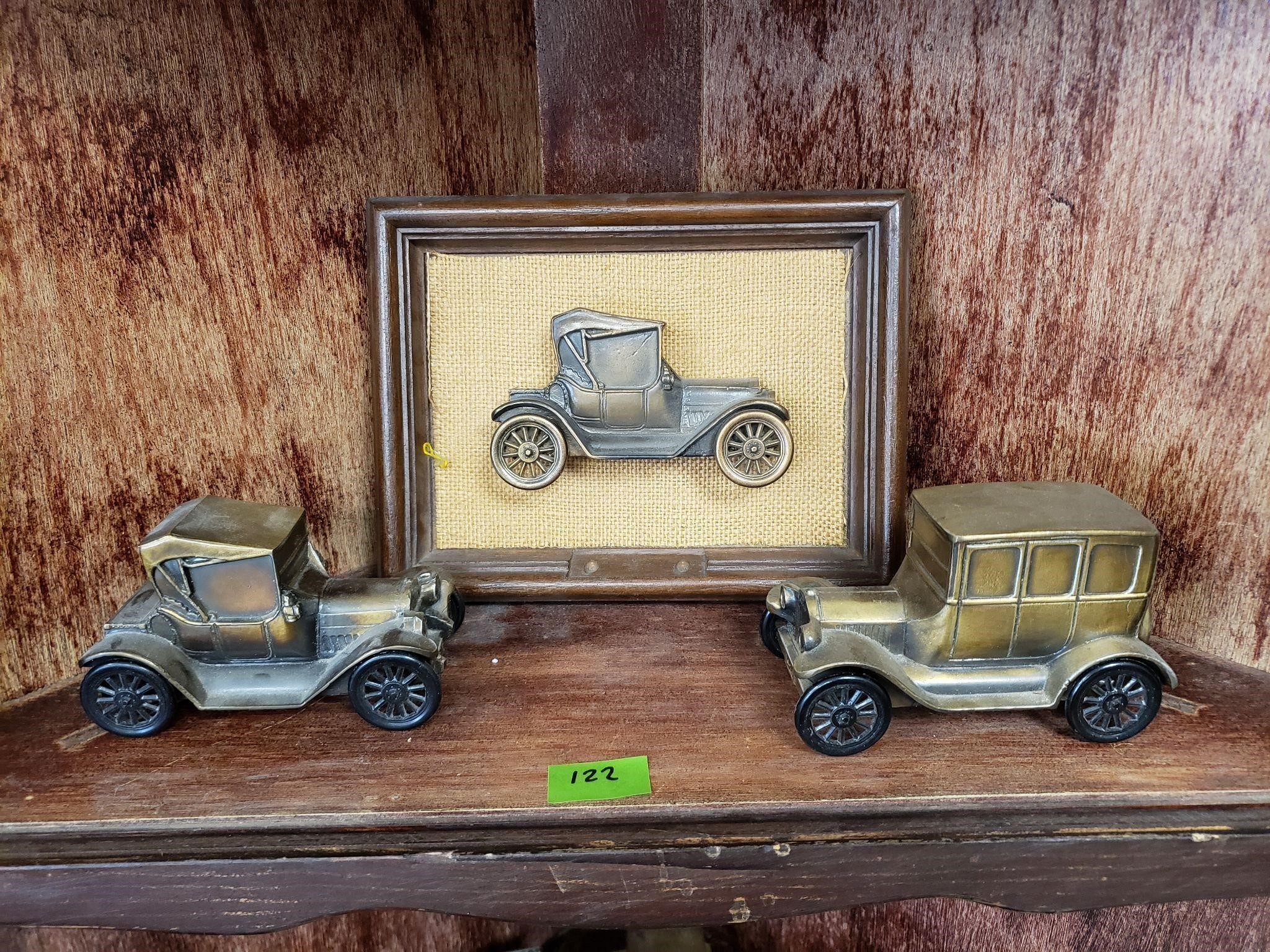 Two Antique Car Banks and One Wall Art