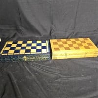 2 vintage chess boards with pieces inside.