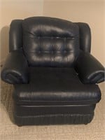 Navy leather styled chair with attached back and