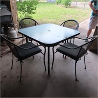 Table and Four Chairs, Outside