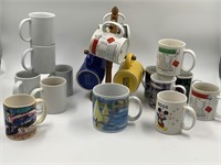 Assortment of coffee, mugs, and a mug holder