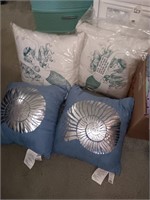 4 pillows 2 are Mermaids and new 2 are chills